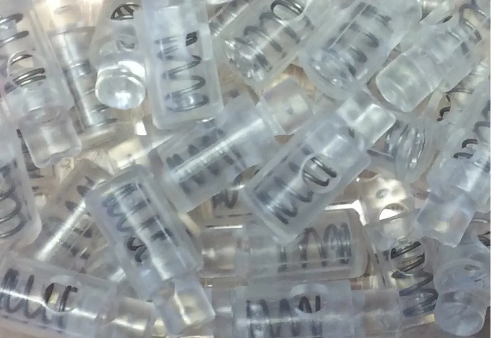 Kordelstopper transparent 1-Loch