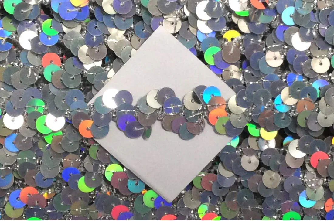 Pailettenborte silber mit multicolor Schimmer 15 mm Welle