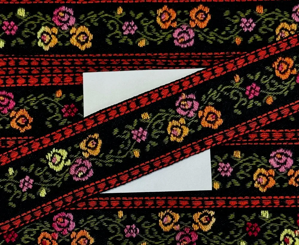 Band/Borte schwarz 25 mm mit rot/gelben Blüten